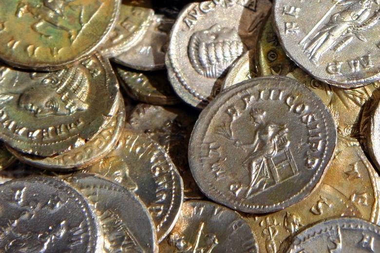 Piles of historical coins