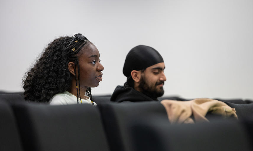 Two students in a lecture