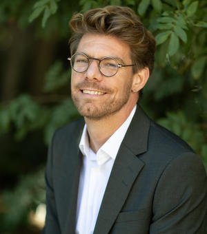 David Henning smiling at the camera